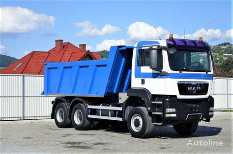 Zdjęcie ciężarówki MAN TGA w wersji wywrotki, prezentujące jej charakterystyczny wygląd i konstrukcję.