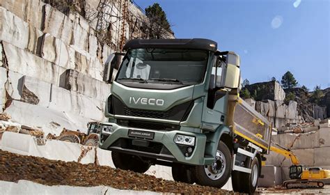 Thematic photo of Iveco Eurocargo truck with a construction site in the background