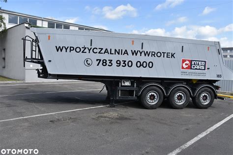 zdjęcie naczepy wywrotki Feber Inter Cars z podniesioną osią