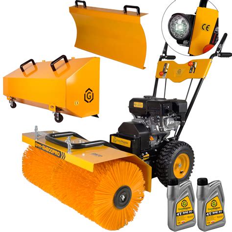 Schemat budowy zamiatarki drogowej z podziałem na główne komponenty: system ssący, zbiornik na zanieczyszczenia, system szczotek (walcowe i boczne), układ napędowy, kabina operatora.