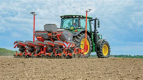 Kuhn Maxima corn planter working in a field