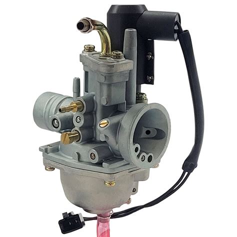 Zdjęcie poglądowe gaźnika Tillotson z zaznaczonymi wymiarami montażowymi