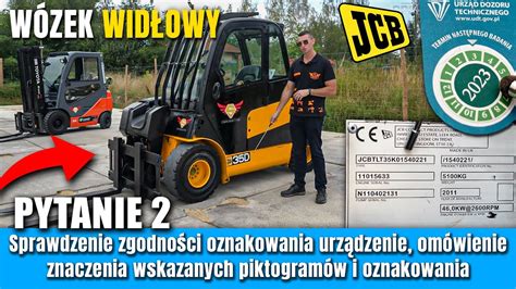 Zdjęcie przedstawiające serwisanta pracującego przy maszynie budowlanej marki JCB.