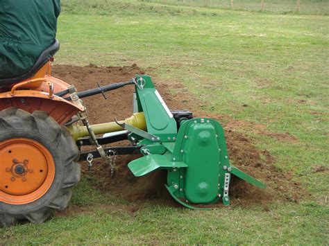 Photo of a compact tractor with an attached separating tiller