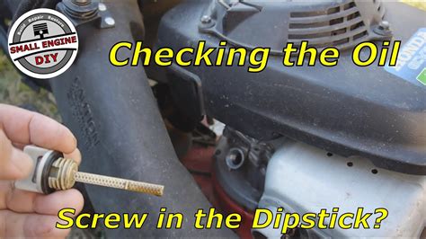 Diagram illustrating the oil filling and checking points in a lawn tractor engine