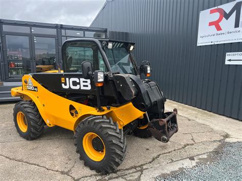 Zdjęcie historycznej ładowarki teleskopowej JCB Loadall 520