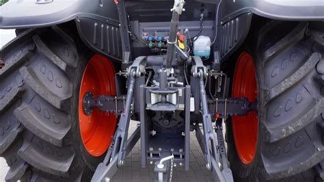 Tylny TUZ ciągnika Kubota M6001 Utility z mniejszym rozstawem osi