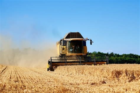 Thematic photo of a vintage Massey-Ferguson 206 combine harvester working in a field