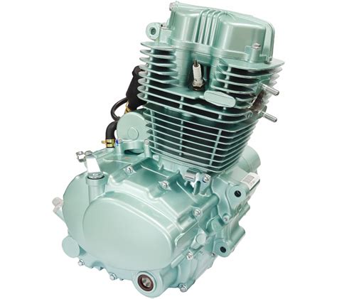 Zbliżenie na silnik FL-2 chłodzony powietrzem, z widocznymi żebrami chłodzącymi i wentylatorem.