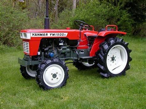 Thematic photo of a vintage Yanmar mini tractor working in the field