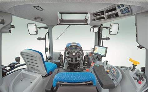 Interior of a New Holland T7 tractor cabin, highlighting ergonomic controls and spaciousness