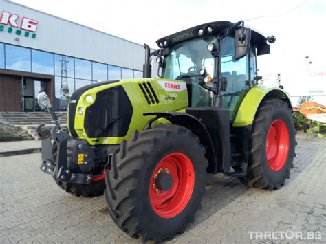 Thematic photo of Claas Arion 610 CIS tractor in the field