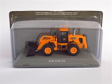 Metalowy model koparki JCB w skali 1:32