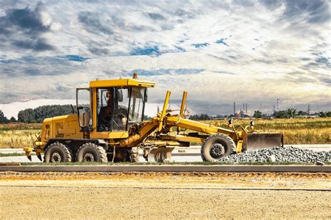 Thematic photo of a modern road grader at work