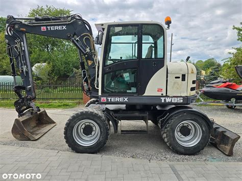 Zdjęcie minikoparki Terex HR 32 z zamontowanym Powertilt