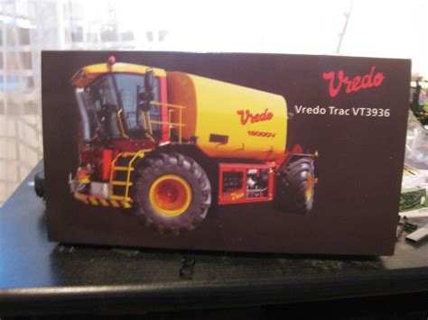 The Siku Vredo seeder model in 1:32 scale, showing intricate details and robust design.