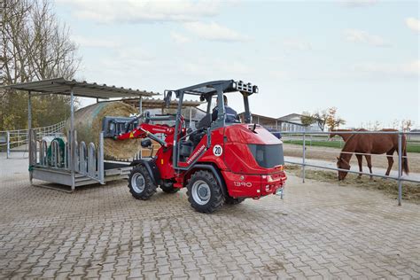 Thematic photo of Weidemann loader working on a farm