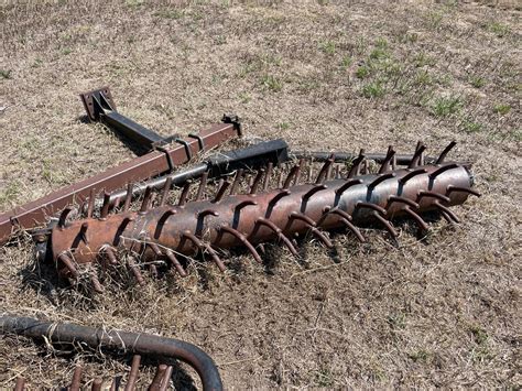 Scheme of an active harrow with marked areas prone to clogging