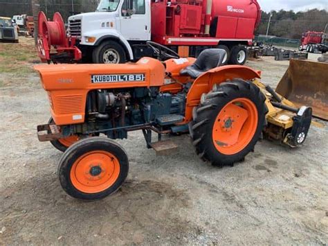 Thematic photo of a Kubota L185 mini tractor