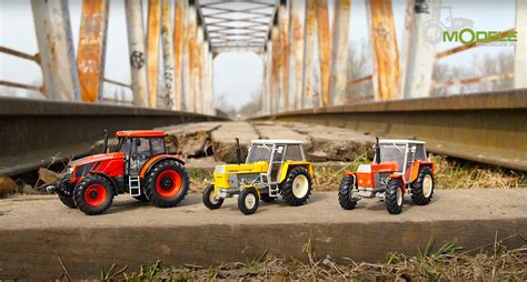 Różnorodność modeli traktorów i maszyn rolniczych dostępnych w sklepie.