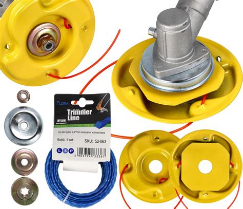 zdjęcie kosy spalinowej Bavaria z różnymi akcesoriami (tarcza, głowica żyłkowa, pas) oraz zestawem kluczy