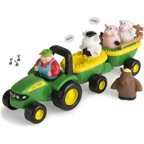 Zdjęcie traktora John Deere ze zwierzątkami w ruchu, prezentujące jego interaktywne funkcje