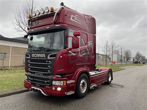 zdjęcie ciągnika siodłowego Scania R730 V8 10x8 w Australii z ładunkiem rudy żelaza