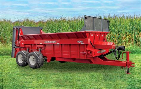 Thematic photo of a modern manure spreader in operation on a field