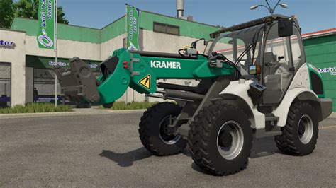 Kramer KL 25.5 telehandler working on a farm, e.g., moving feed