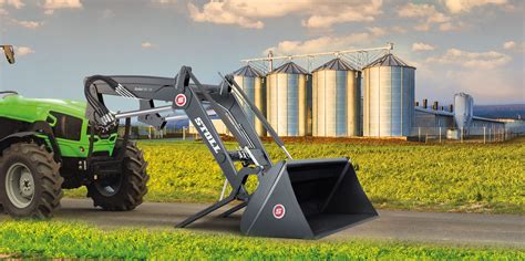 Thematic photo of a Stoll Solid front loader in action on a farm