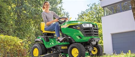 The John Deere R43S/R43BA lawnmower in action, highlighting its compact design and the Turbostar collection system.