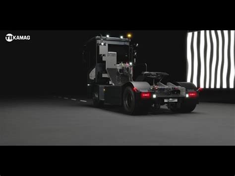 KAMAG PrecisionTractor 201 w akcji, manewrujący naczepą na placu terminalu