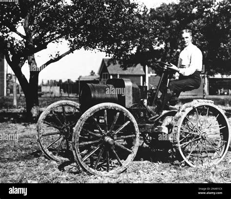 Historical photo of Henry Ford with a Fordson tractor