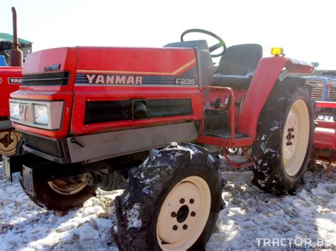 Thematic photo of Yanmar F235 tractor working in a field