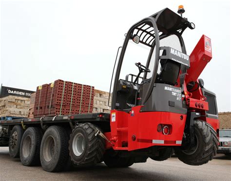 Manitou TMT series forklift attached to a truck