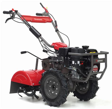 Glebogryzarka Hortmasz HGS X620N z zamontowanymi kołami i pługiem do orki