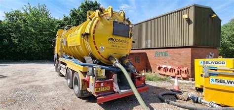 Photo of a tanker emptying a septic tank
