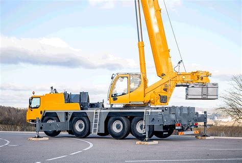 Thematic photo of a large Liebherr mobile crane in action on a construction site