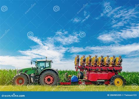 Thematic photo of a modern corn seeder in the field