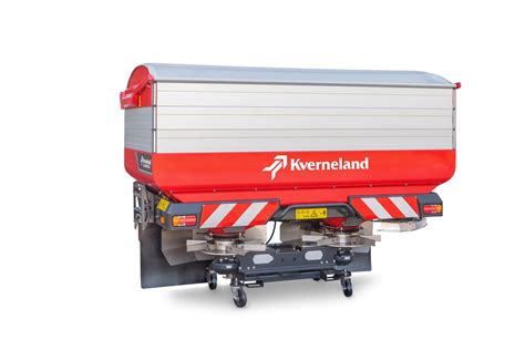 Rozsiewacz Kverneland TL Geospread wyposażony w dwie aluminiowe nadstawki