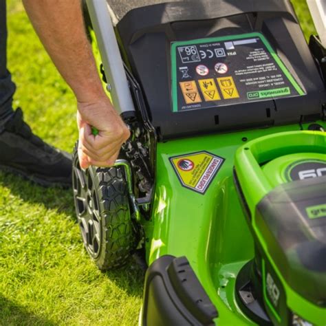 The Greenworks GD60LM46HP 60V 46 cm cordless lawnmower, emphasizing its modern design and powerful brushless motor.