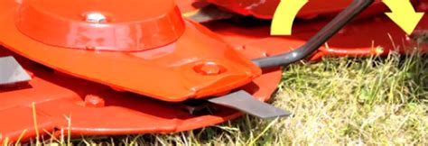 Ilustracja przedstawiająca działanie bezdotykowej technologii cięcia w ręcznej kosiarce bębnowej