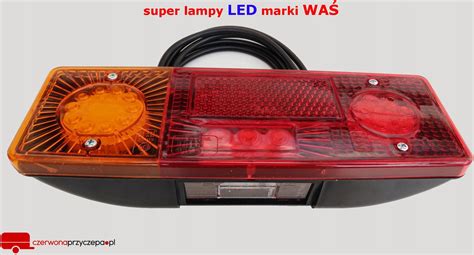 Zdjęcie tylnej części przyczepy z uchylnymi lampami LED