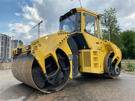 Photo of a road construction site with a large road roller