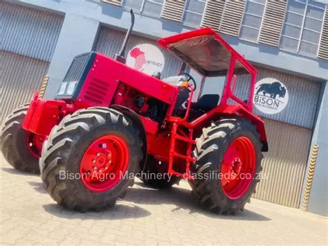 Thematic photo of a Belarus 820 tractor in the field