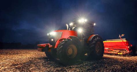 Thematic photo of a tractor with lights on