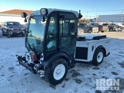 Thematic photo of a municipal tractor at work