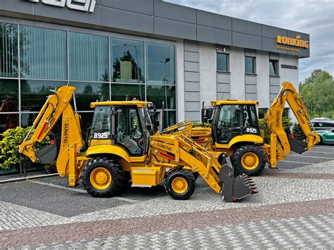 porównanie koparko-ładowarek CAT i JCB