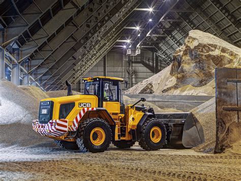 The JCB 457 ZX articulated loader working on a construction site, loading materials