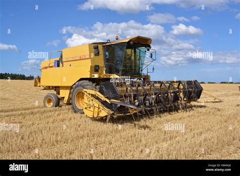 The New Holland TX36 combine harvester in a field during harvest